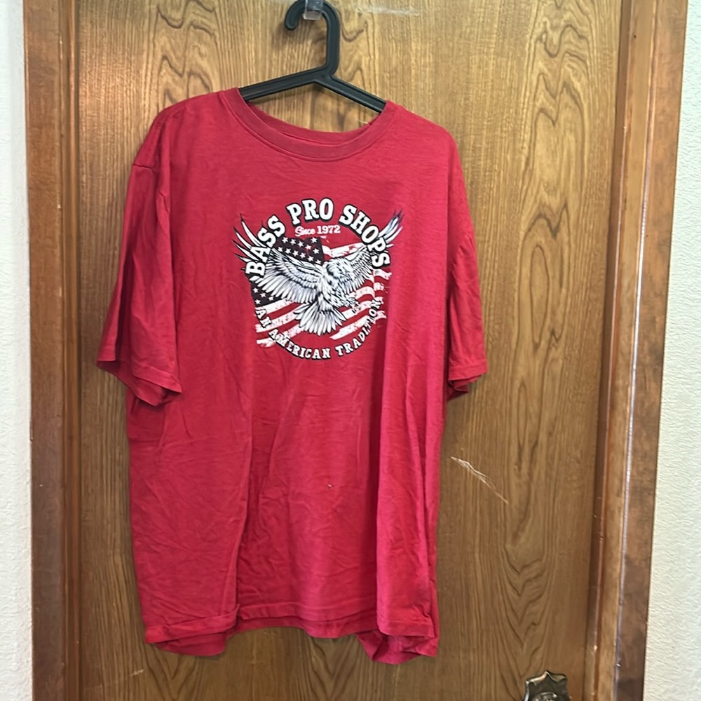 Red 2022 Bass Pro shop shirt with America resemblance on it not in store no more